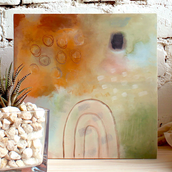 an abstract painting by Mandy is muted burnt orange and greens