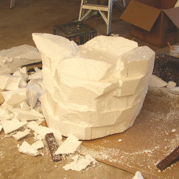 picture of the foam being carved in to a sculpture