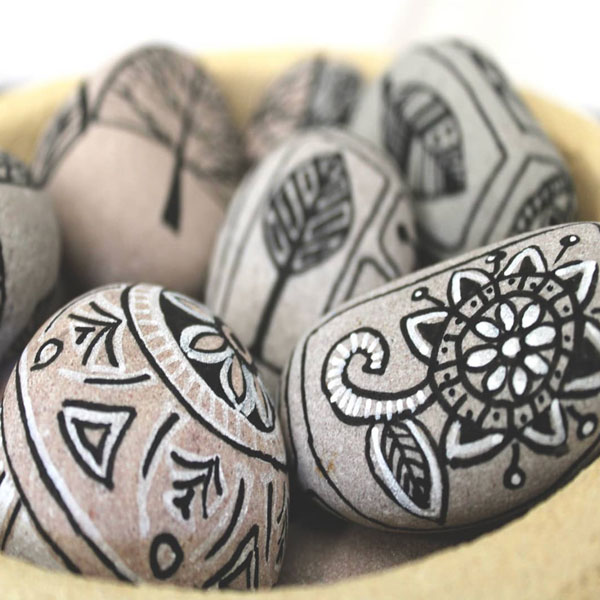 a closeup of black and gray painted rocks